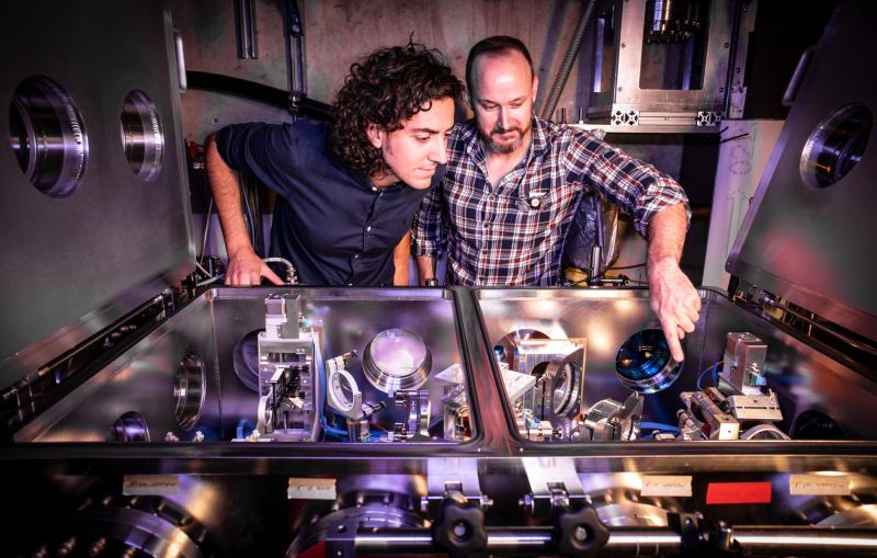 Claudio Emma and Brendan O’Shea examine experimental apparatus.